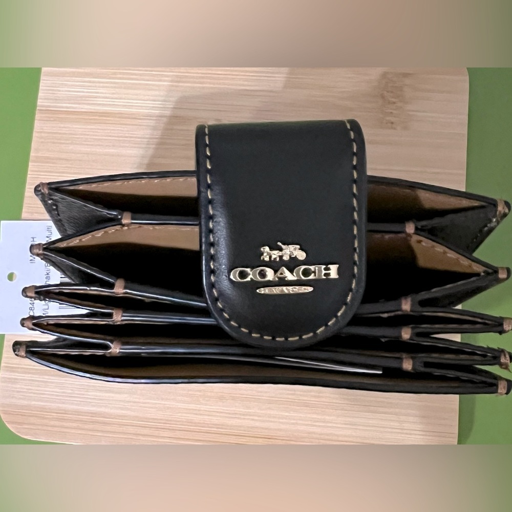 Coach Black Leather Wallet with Gold Accents